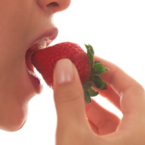 Woman Eating Strawberry MS