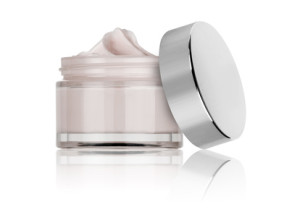 glass jar of beauty cream with cap, isolated
