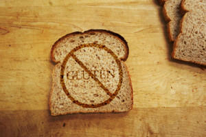 Slice of bread with Gluten text - Gluten Free diet concept