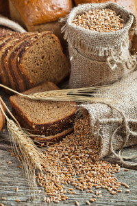 Fresh Bread And Wheat On The Wooden