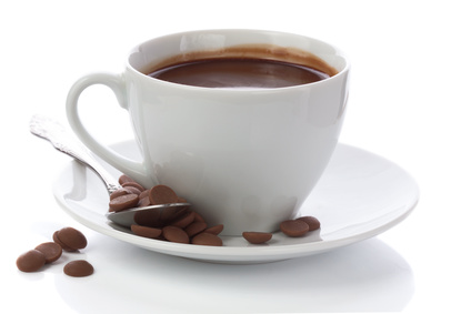 Hot Chocolate In White Cup And Chocolate Chips Isolated On White